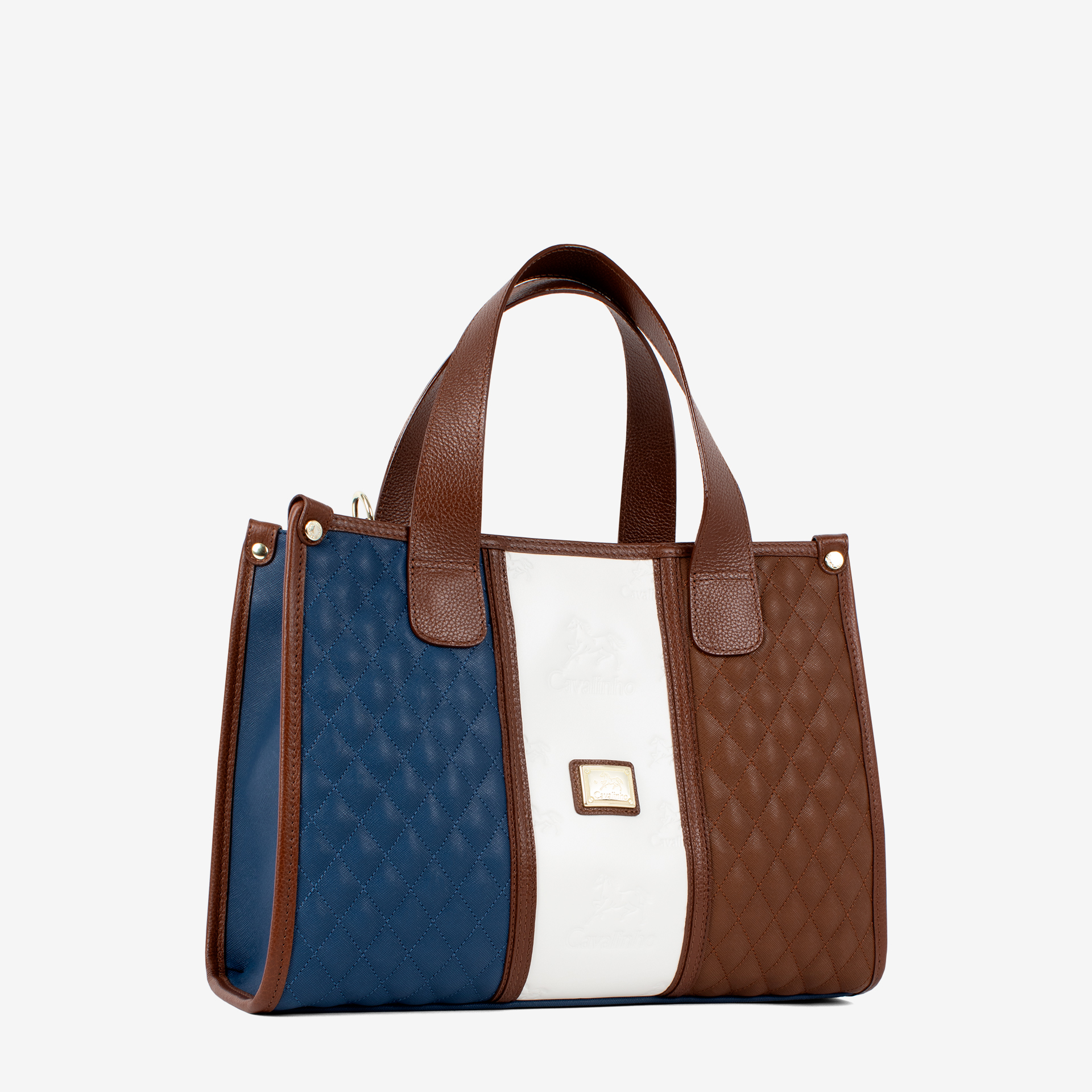 Mala Mão Cavalinho Sublime Com um formato estruturado é ideal para organizar os seus essenciais com elegância e de forma prática. Esta mala combina design clássico com detalhes contemporâneos sendo o acessório perfeito para realçar qualquer um dos seus looks, do profissional ao casual chique.