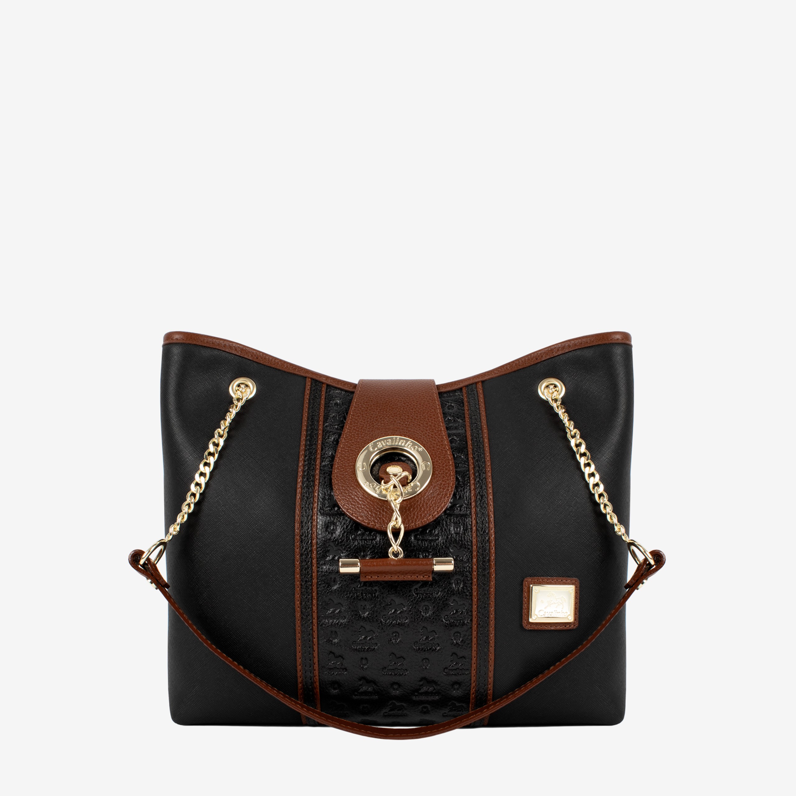 Mala Ombro Cavalinho Origem Esta mala de ombro é o acessório ideal para a mulher que busca combinar elegância intemporal com uma funcionalidade superior. Perfeita para o ambiente de trabalho, eventos sociais ou para o dia a dia. Desenhada para otimizar a sua organização e facilitar o acesso aos seus pertences.