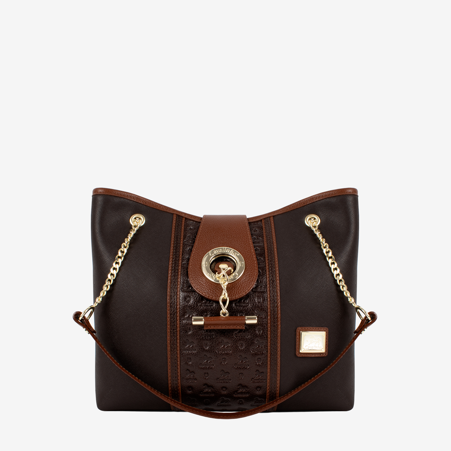 Mala Ombro Cavalinho Origem Esta mala de ombro é o acessório ideal para a mulher que busca combinar elegância intemporal com uma funcionalidade superior. Perfeita para o ambiente de trabalho, eventos sociais ou para o dia a dia. Desenhada para otimizar a sua organização e facilitar o acesso aos seus pertences.