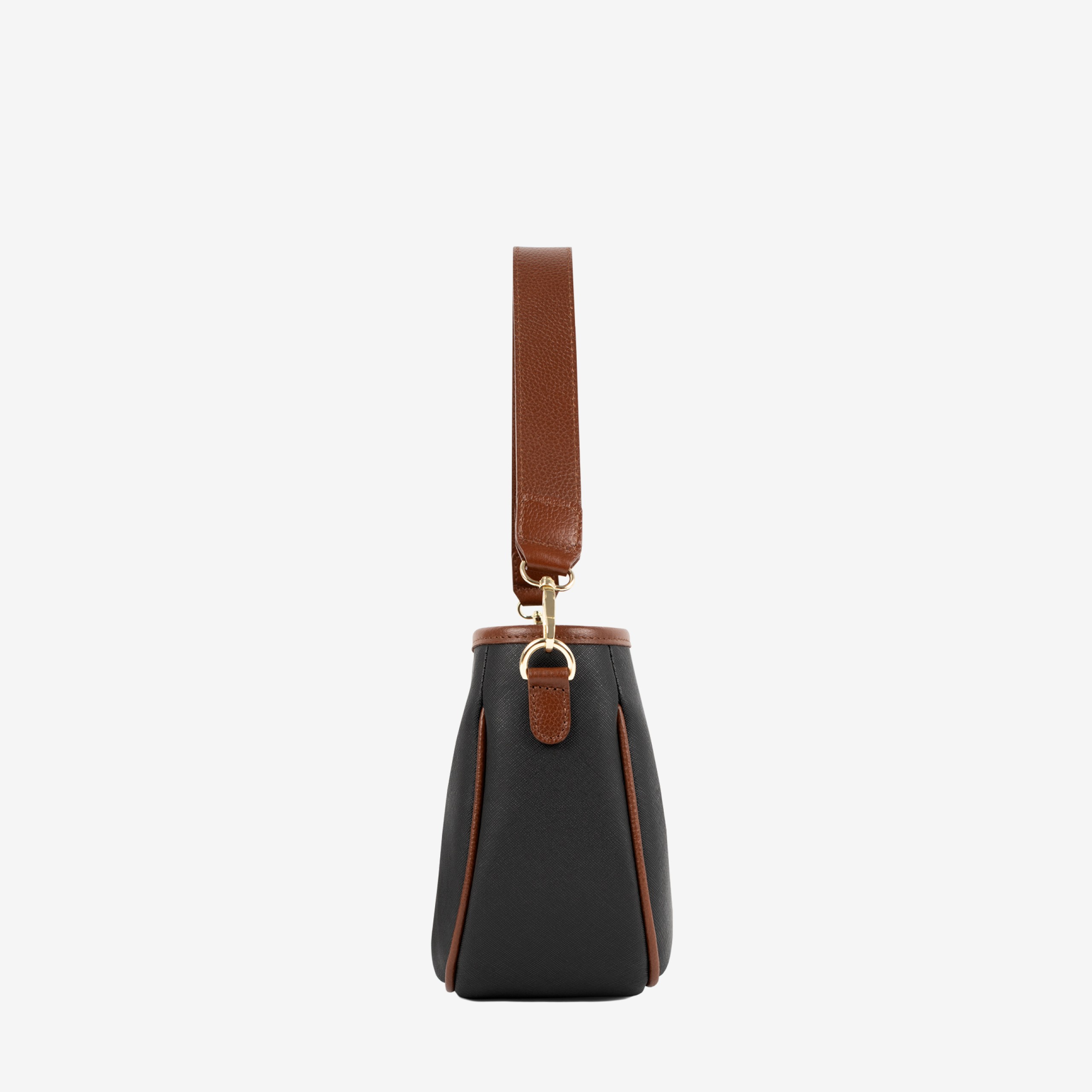 Mala Ombro Cavalinho Origem Leve tudo o que precisa com esta mala de tiracolo elegante. Organize o essencial e mantenha as mãos livres com conforto e segurança. Ideal para manter os seus essenciais organizados e acessíveis. Este modelo tiracolo é perfeito para passeios e encontros casuais. Desfrute de conforto e estilo em cada saída. Adicione um toque de charme aos seus outfits.