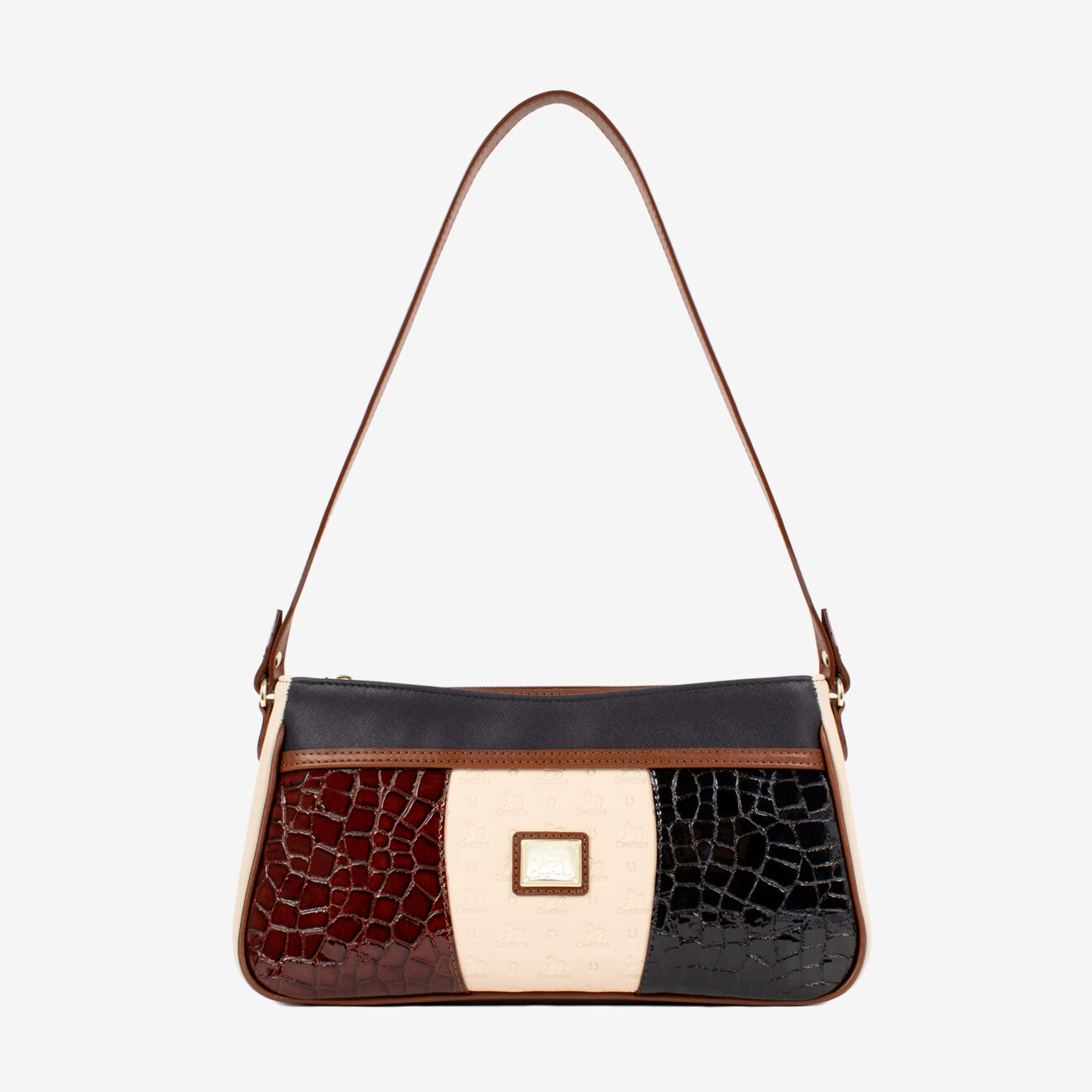 Mala Ombro Cavalinho Essência Esta mala de ombro é o acessório ideal para a mulher que busca combinar elegância intemporal com uma funcionalidade superior. Perfeita para o ambiente de trabalho, eventos sociais ou para o dia a dia. Desenhada para otimizar a sua organização e facilitar o acesso aos seus pertences.